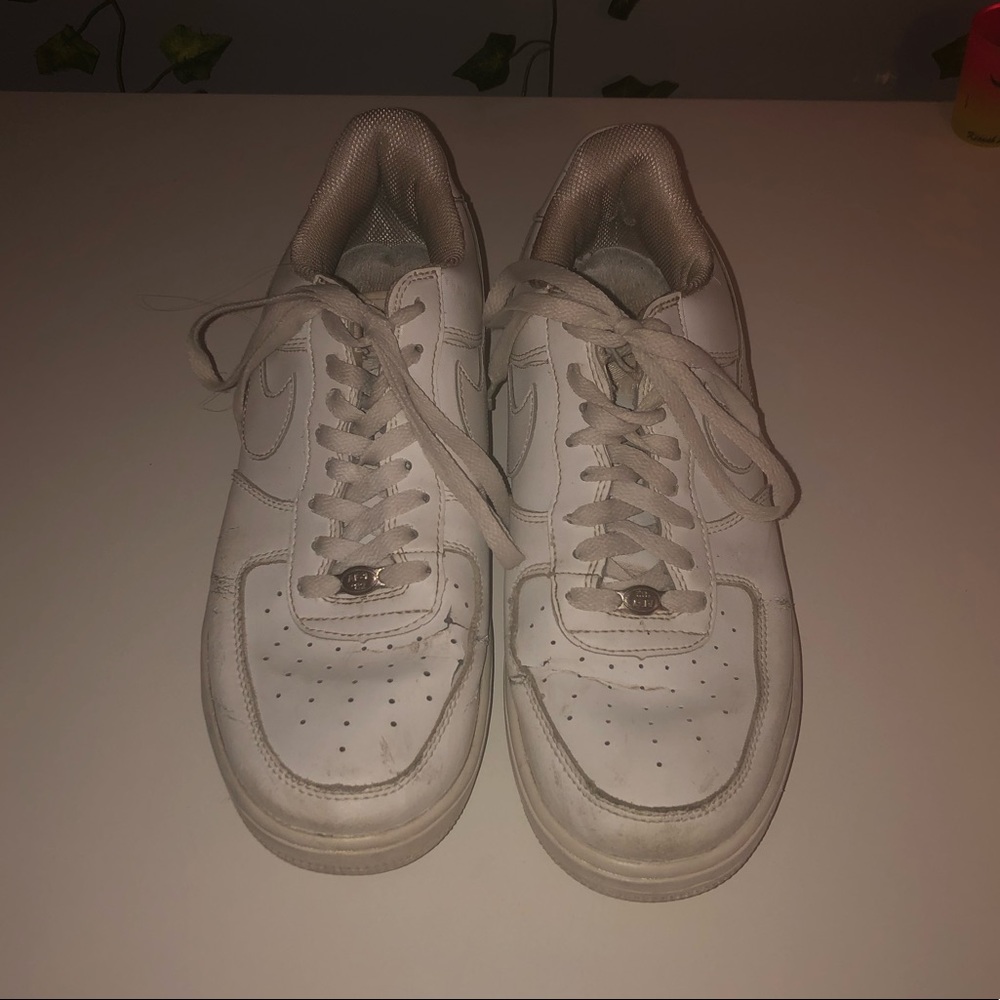 Worn Air Force 1s